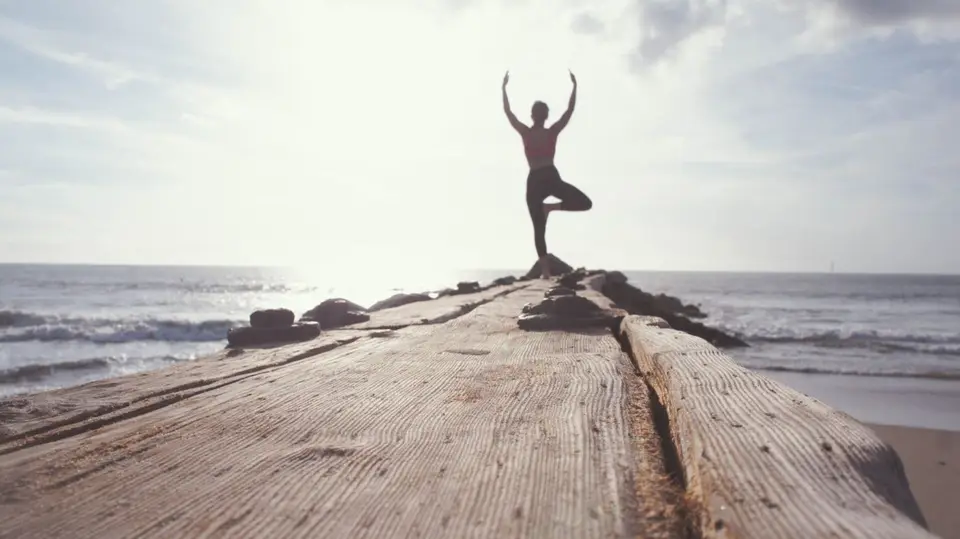 Yoga pose by the seaside