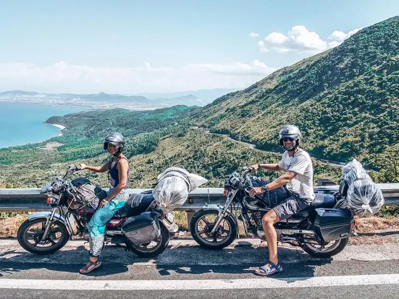 Picture of two people on motorbikes on the Hai Van Pass between Hue to Hoi An Vietnam