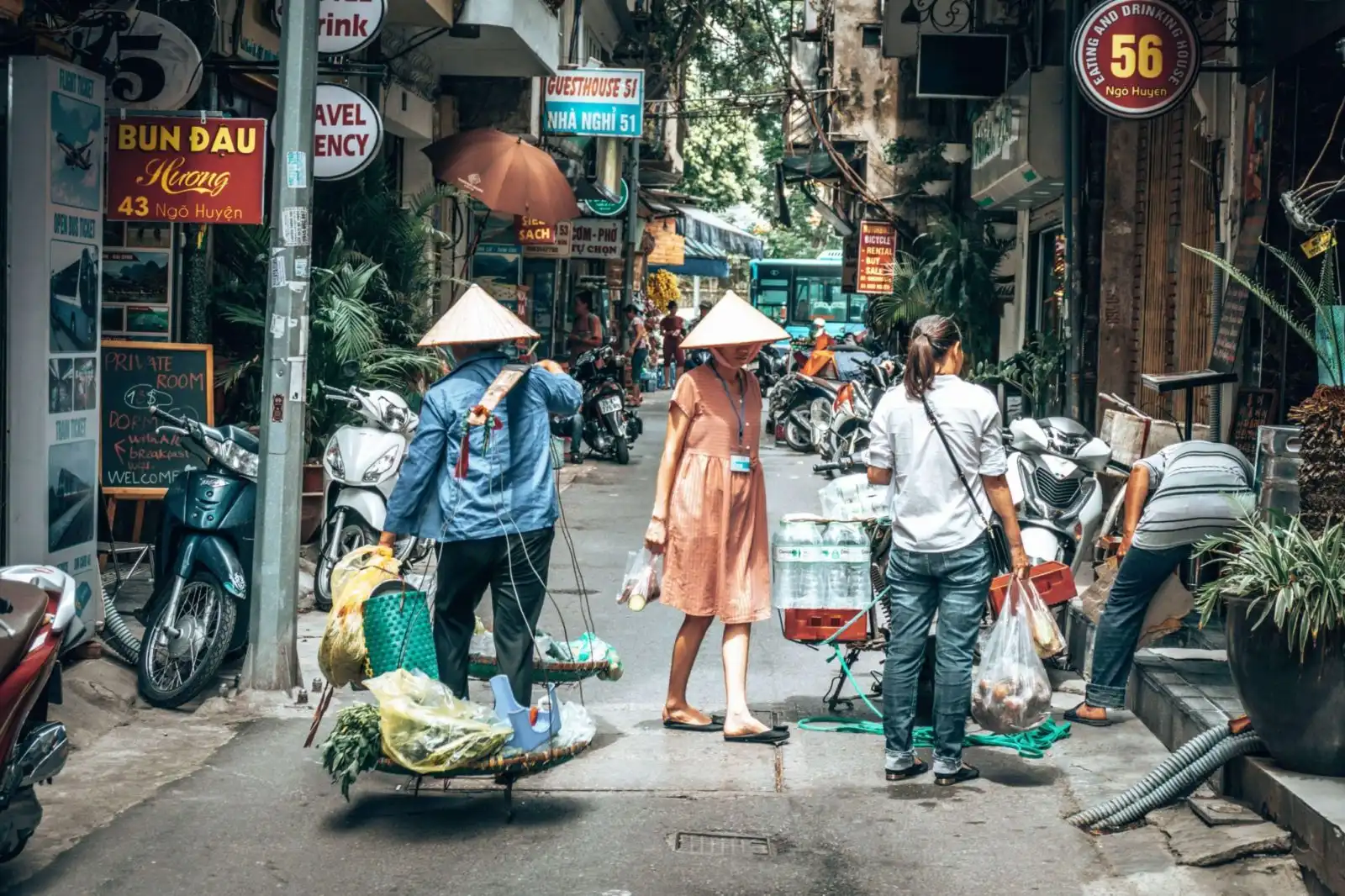 People walking around Hanoi Old Quarter