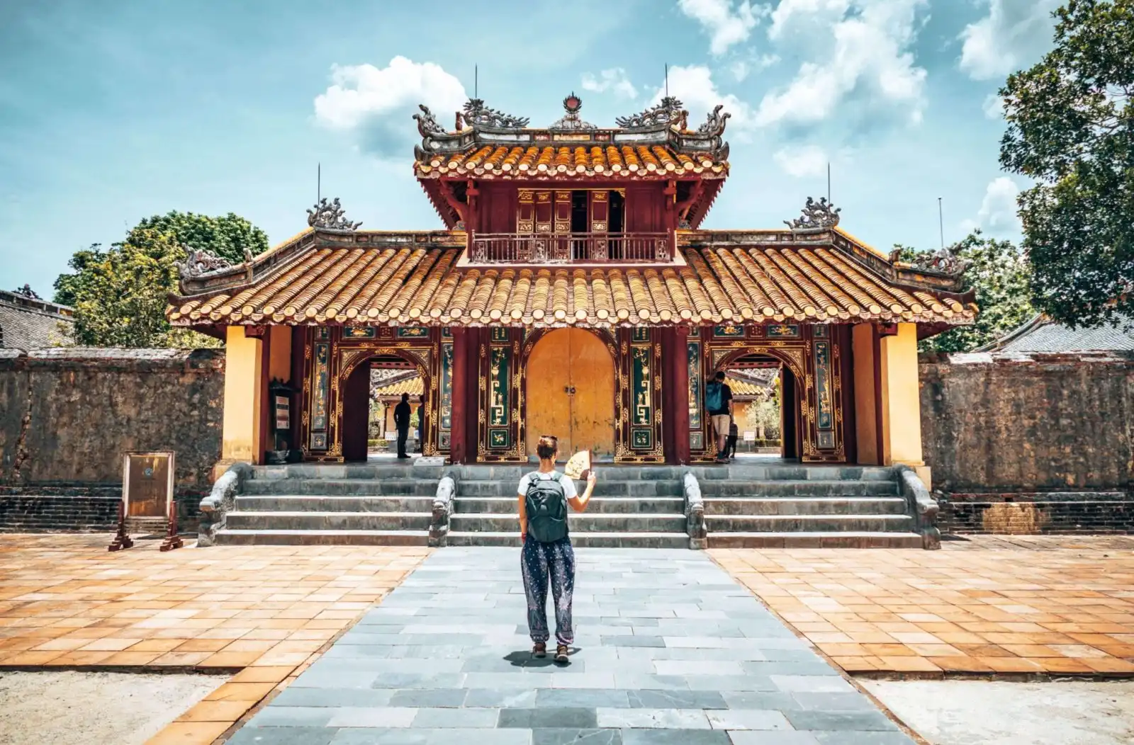 Picture of girl standing in front of Hue tomb