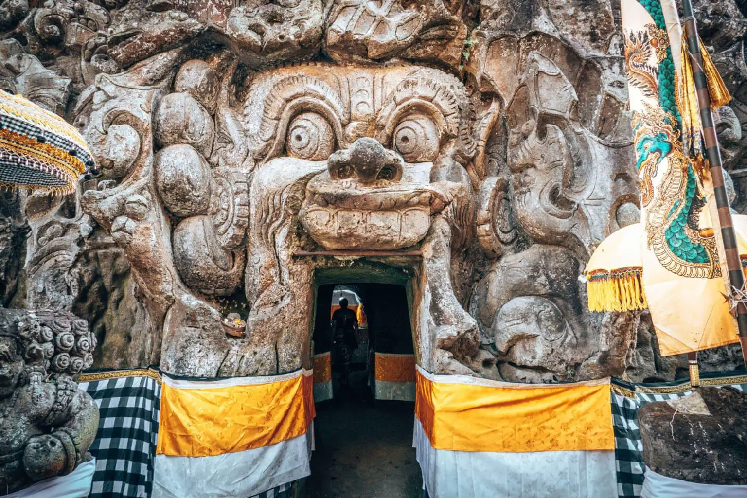 Ubud Waterfall Tour - Goa Gajah Temple rock face